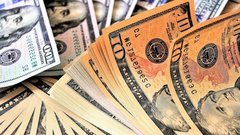 Курс доллара на внебиржевом рынке опустился ниже 77 рублей